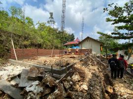 OPNAME PEMBANGUNAN GEDUNG PERPUSTAKAAN KALURAHAN